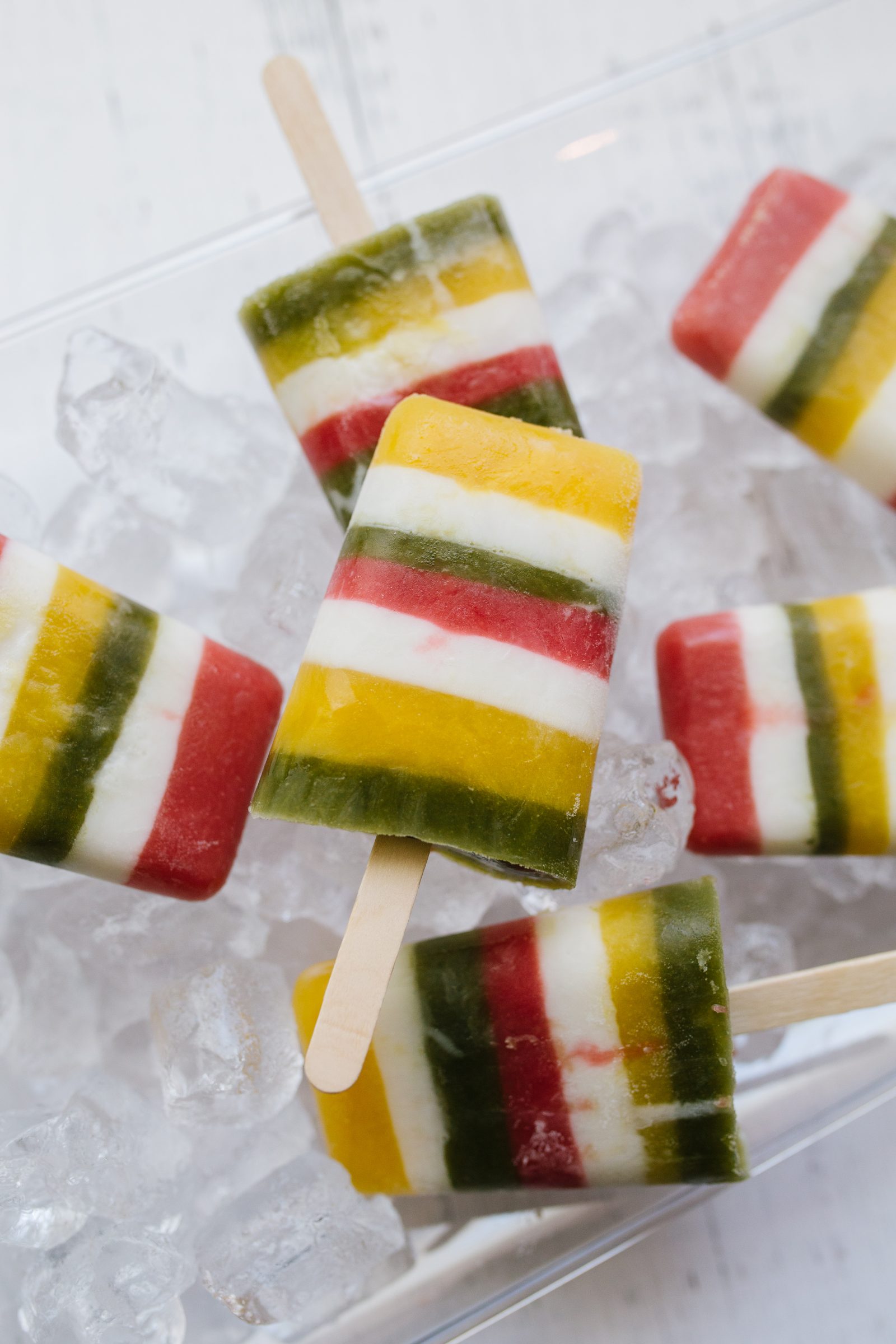 Summer Snacks: Colorful Layered Fruit Juice Popsicles + a tutorial featured by Top US Craft Blog + The Pretty Life Girls